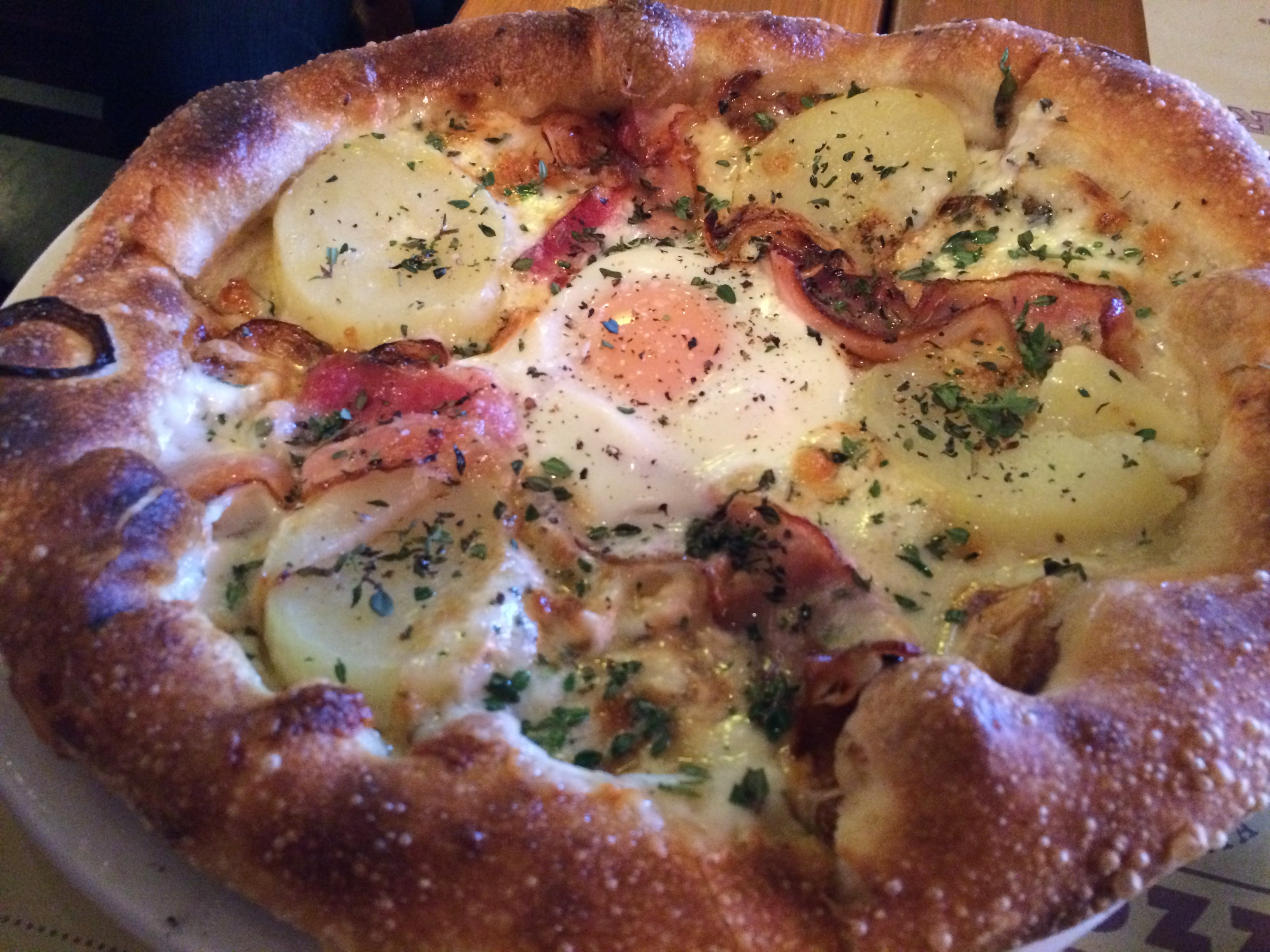 Pizza with Brussel Sprout Shavings, Guanciale and Bufala Mozzarella