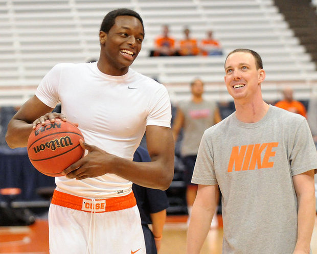 Guard Jerami Grant with Syracuse basketball great, Jerry MacNamara