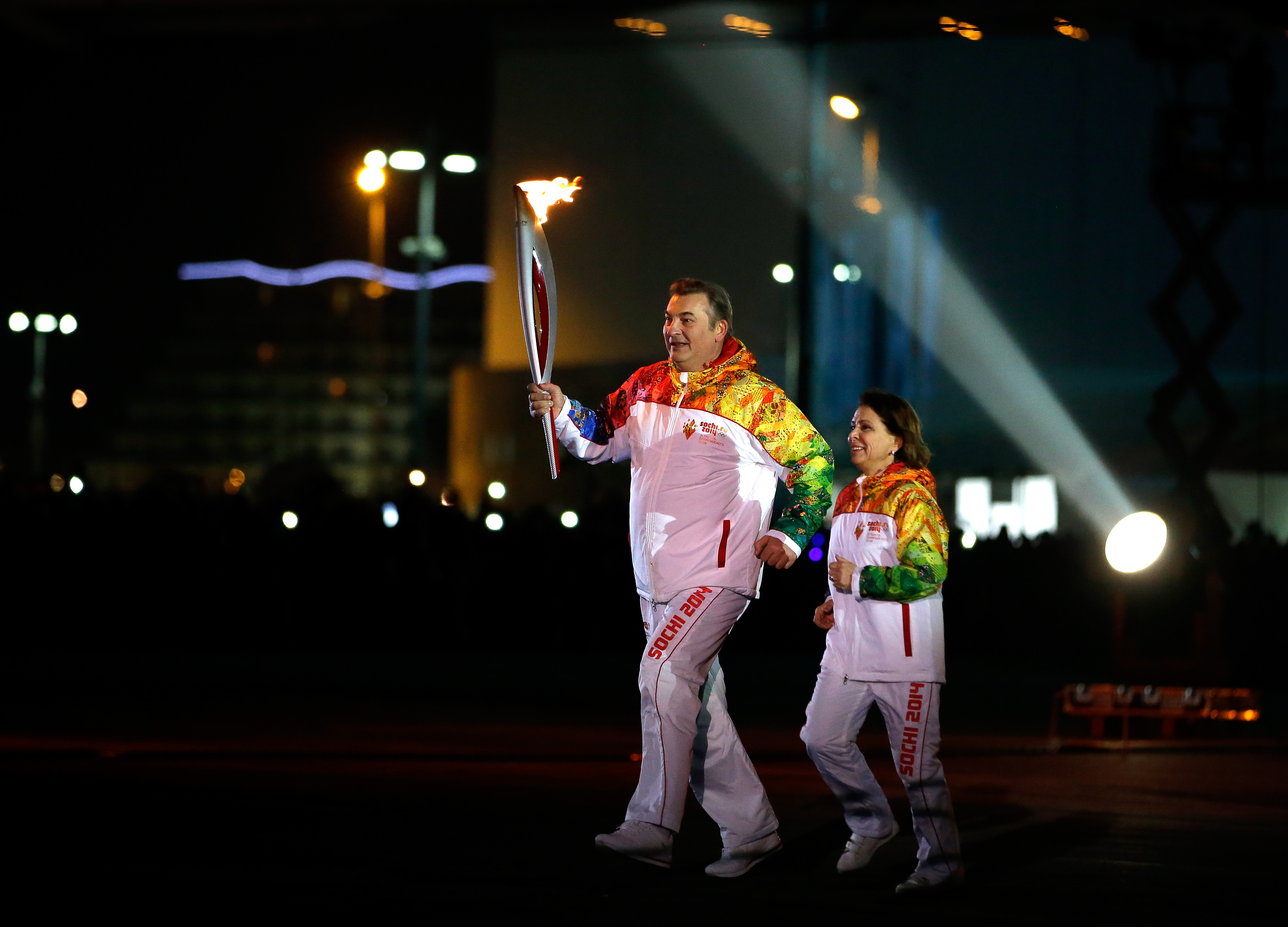 Irina Rodnina and Vladislav Tretiak Lighting Olympic Torch/NBS Sports