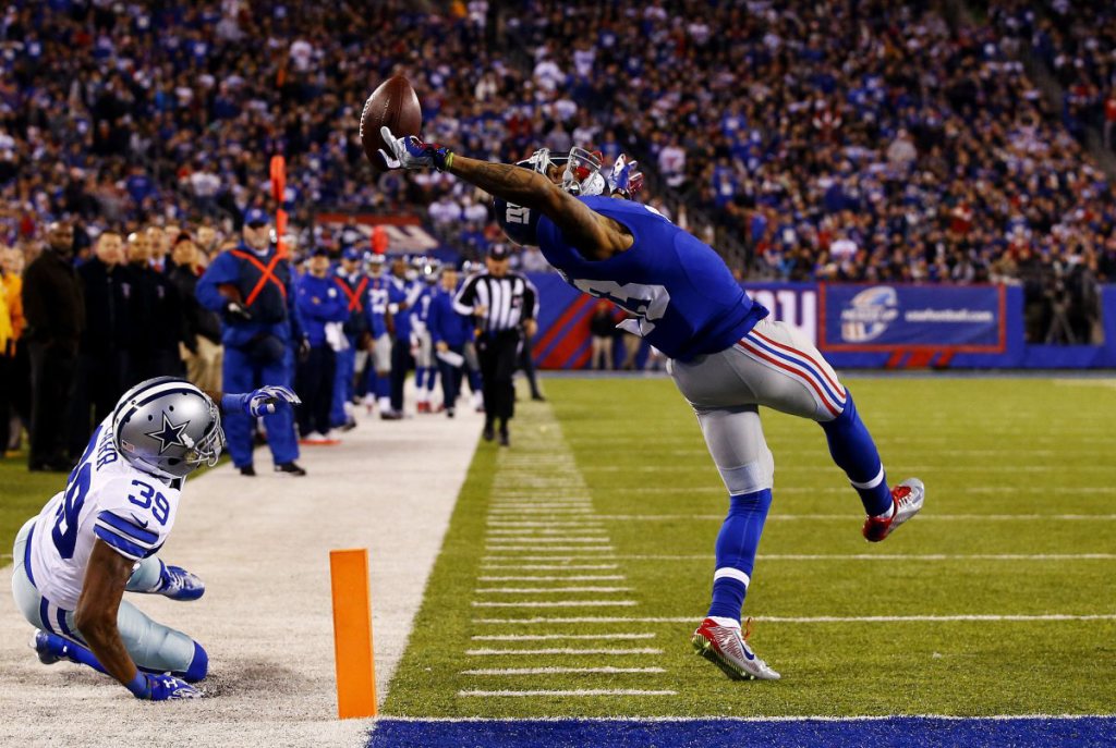 NY Giant Odell Beckham Greatest Catch Against Cowboys/photo:time.com